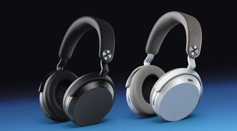 Two wireless over-ear headphones, one black and one light gray, displayed on a blue gradient backdrop for product showcase.